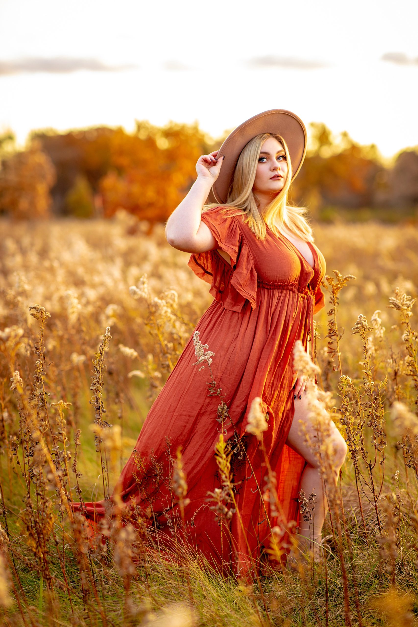 woman in field of tall grass