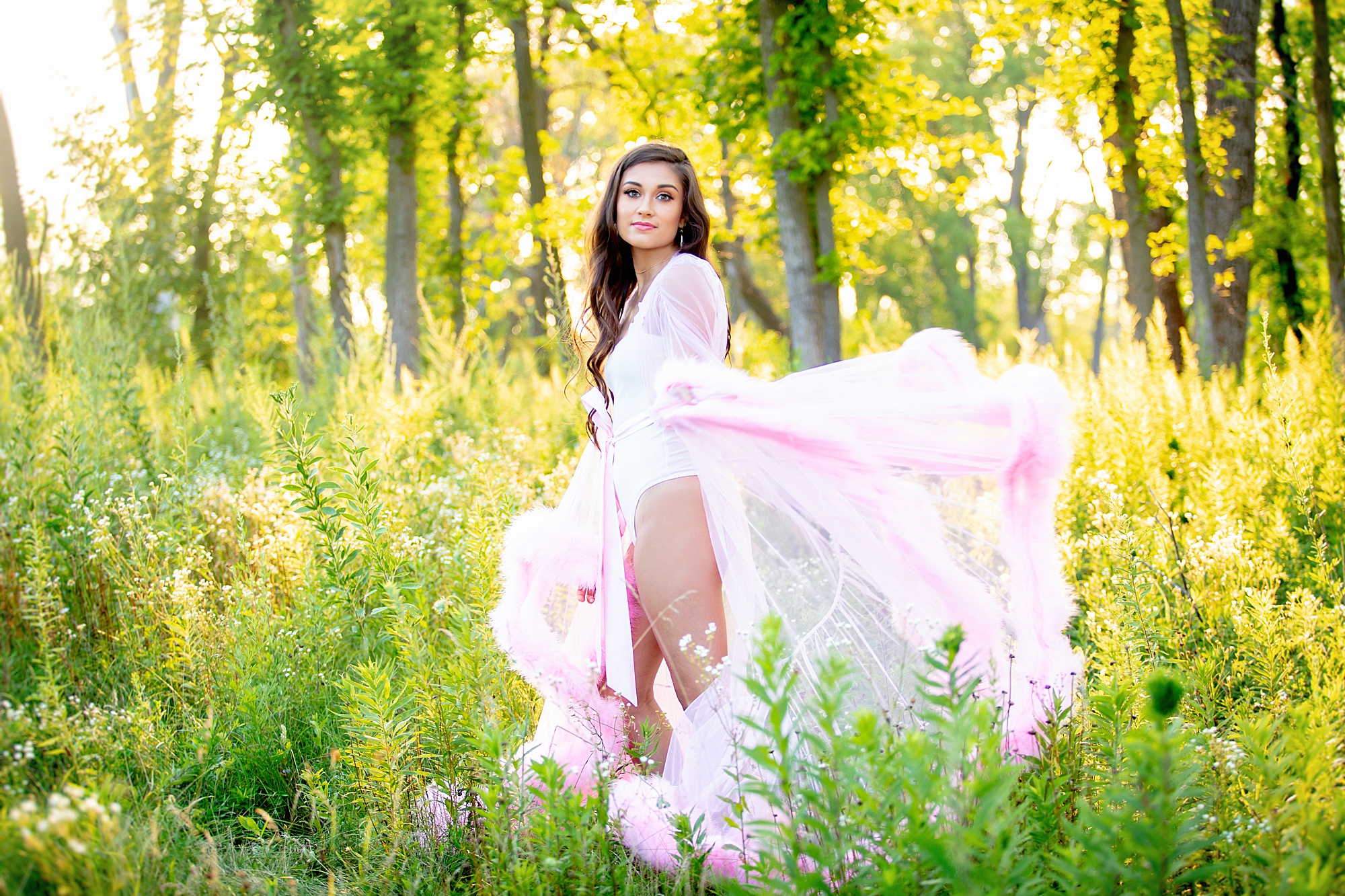 fairy tale picture of senior in pink gown 