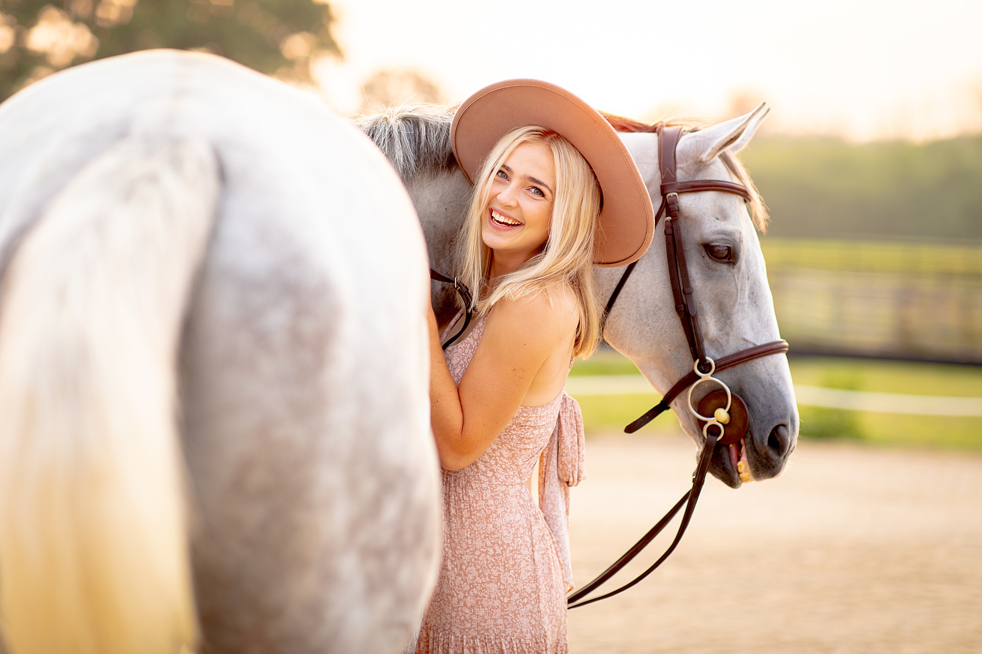 girl with her white horse during session 